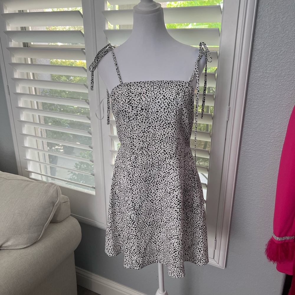 White with black dots dress